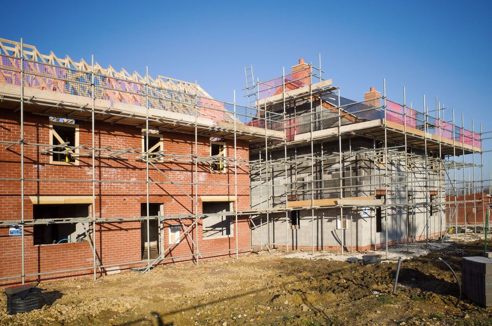 New construction roofing with scaffolding